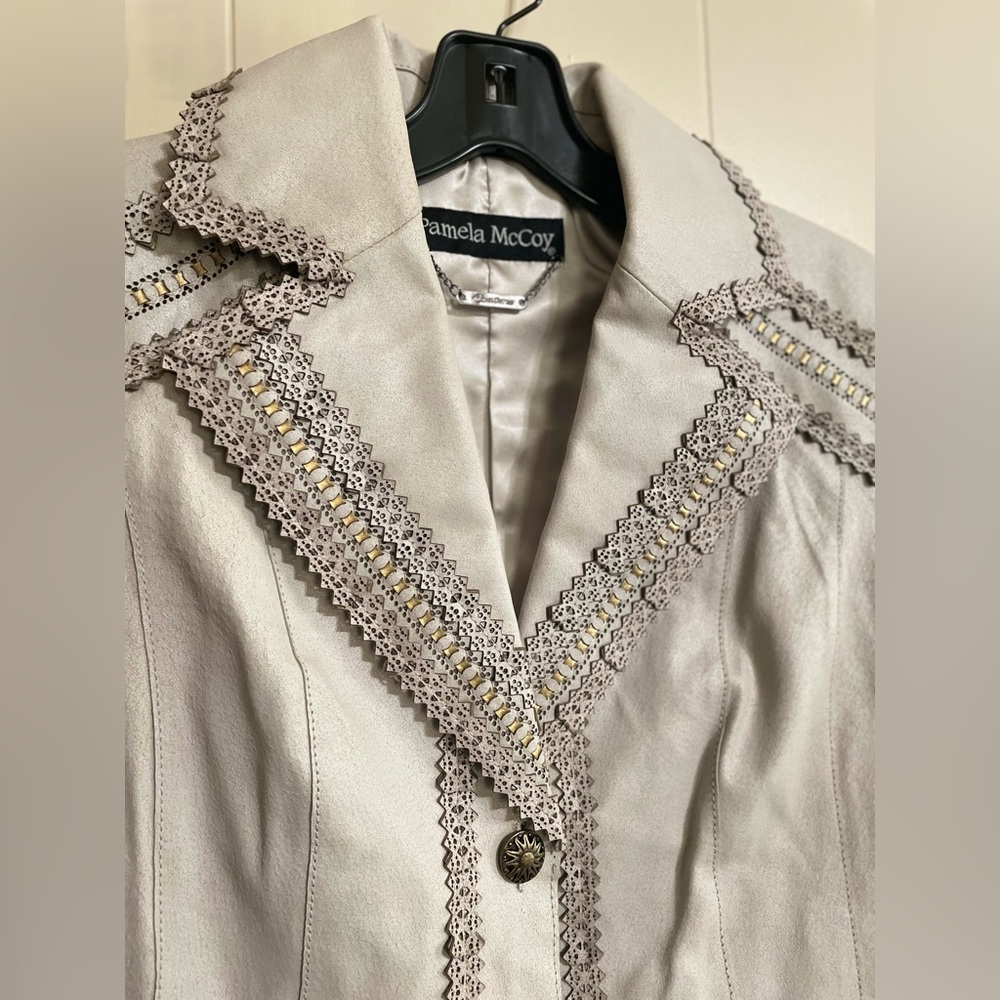 Pamela McCoy Couture, cream-colored suede jacket with detailing. Brand new.